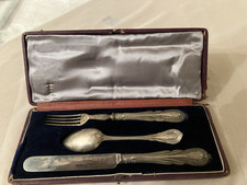 Silver christening cutlery set (knife fork spoon) in box. possibly victorian.
