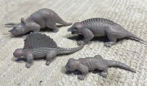 4 Vintage MARX dinoaur playest figures-grey marbled w/pink