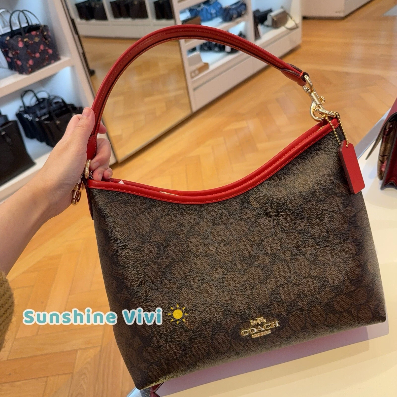 Borsa a tracolla Coach Signature Laurel marrone tela CV975 borsa noce rosso nuova con etichette