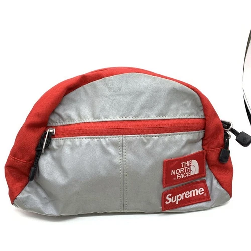 SAC TAILLE RÉFLECTEUR SUPREME THE NORTH FACE ROUGE Occasion