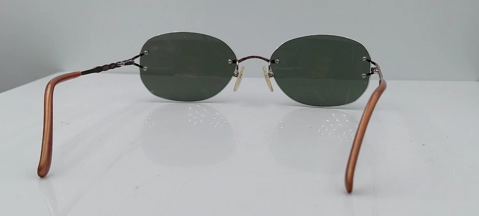 Gafas de sol vintage Tura 490 bronce ovaladas de metal sin montura Japón SOLO MARCOS Foto 4 de 4