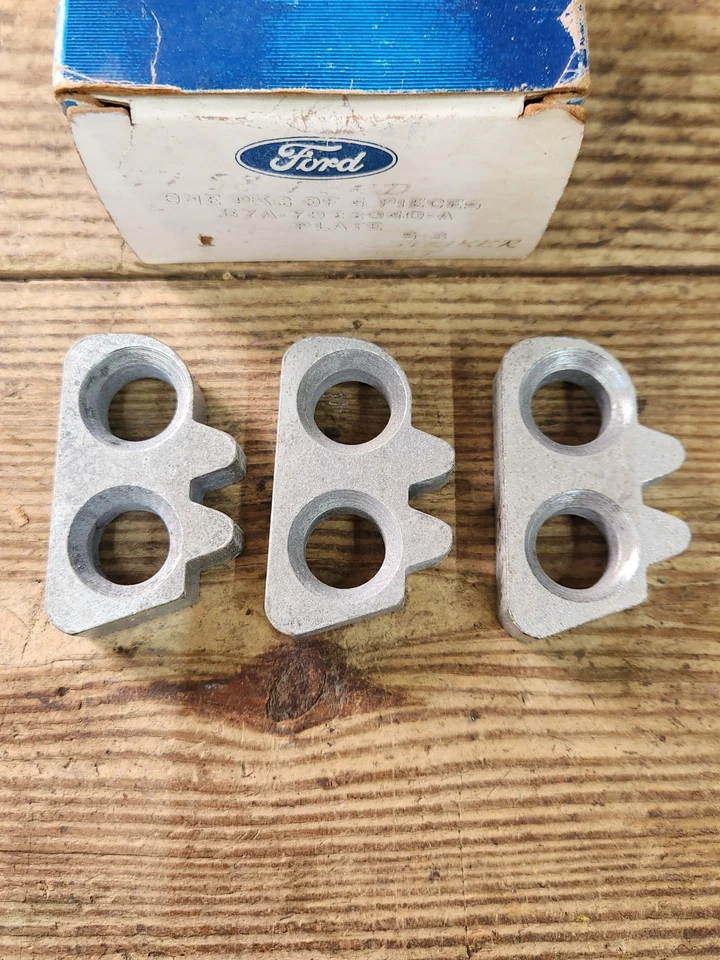 3 NOS 1957 1960 FORD SERIE F MERC CERRADURA PUERTA GOLPEADOR PLACA INSERCIÓN B7A-7022040-A Foto 2 de 4