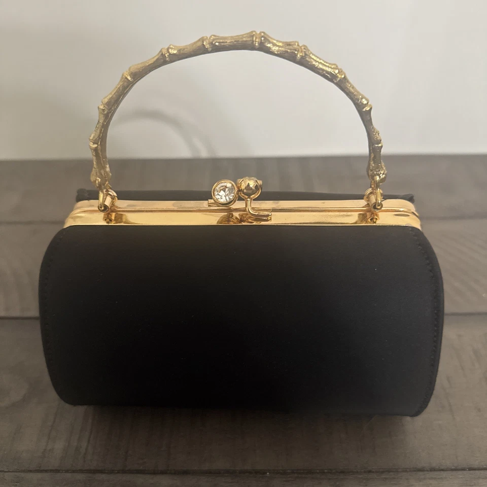 Cartera o bolso de mano vintage Ande’ negro con asa dorada Foto 3 de 4