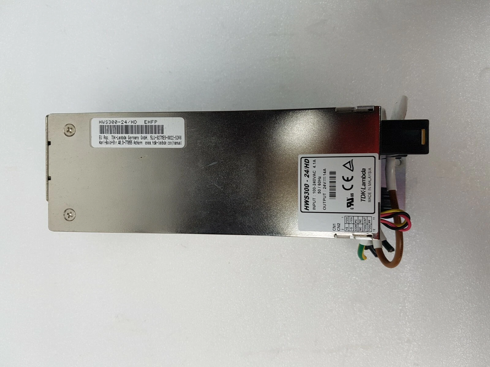 Top of the TDK-Lambda HWS300-24/HD enclosure with the nameplate at the end
