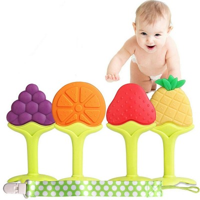 baby chewing on pacifier teething