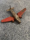 marx press steel red wing plane