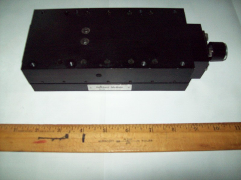 Translation stage, heavy duty, long travel, good (  1 um) repeatability, US made