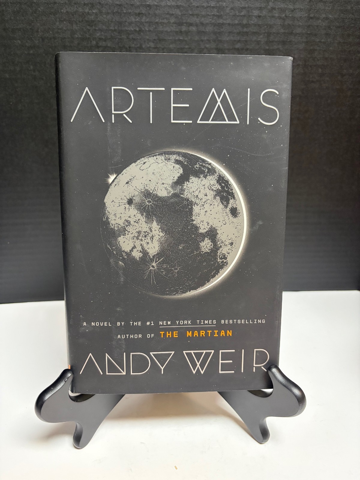Hardcover Edition of the Novel Artemis by Andy Weir Copyright 2017