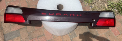 2000-2004 Subaru Outback Trunk Lid Hatch Center Taillight Tail Light Panel