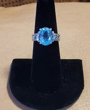Natural Oval Cut Blue Topaz Solitaire 4 Prong Setting  in 925 Silver Ring Size 7