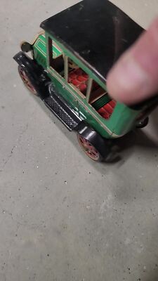 Vintage Green Lever Action Tin Car made by Modern Toys Made In