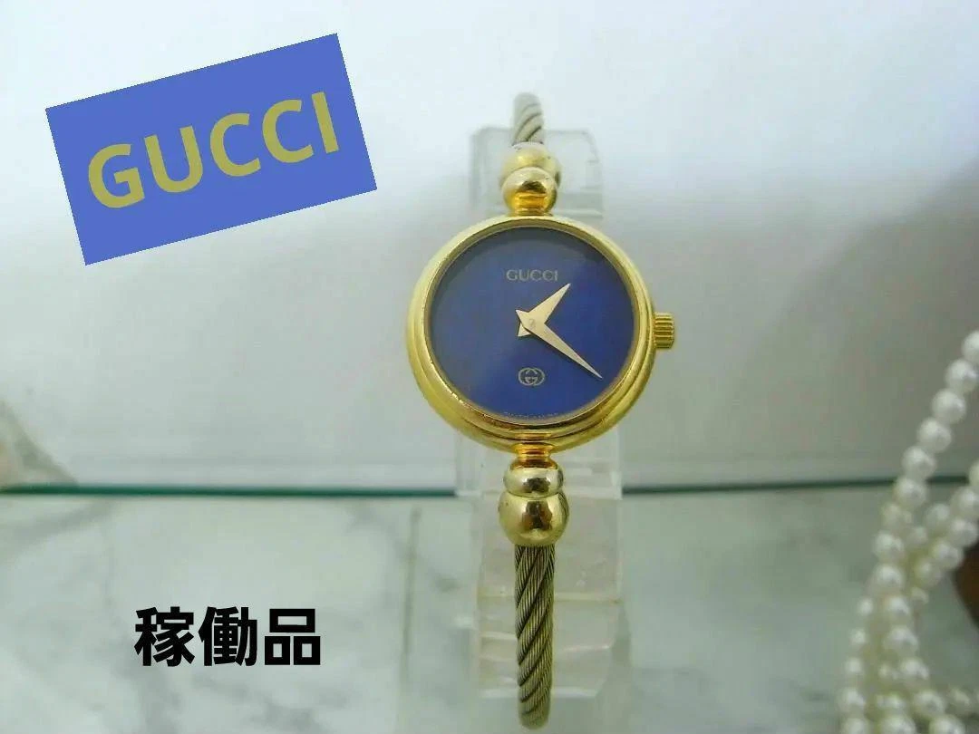 Montre femme GUCCI 2700.L Lapis Lazuli cadran bleu quartz 2 aiguilles occasion ceinture dorée