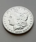 1890-CC MORGAN SILVER DOLLAR/GENUINE 90% SILVER U.S. COIN/RIM DINGS ON REVERSE
