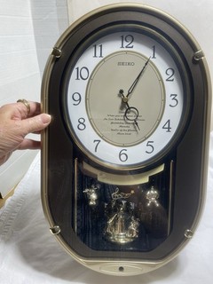 Seiko Melodies in Motion Musical 7 Melodies Oval Wall Clock QXM329NRH Works