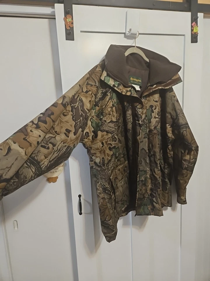 Chaqueta de caza impermeable de nailon para hombre Remington XXL Advantage camuflada de colección Foto 2 de 4