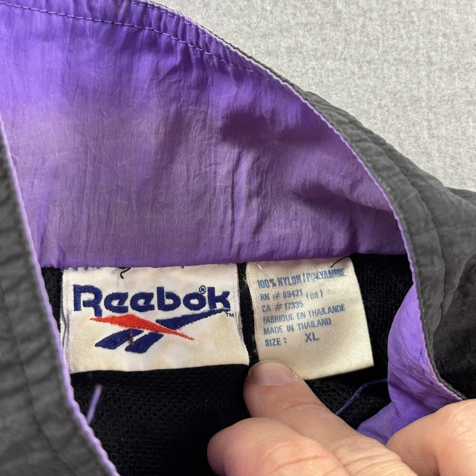Chaqueta cortavientos vintage Reebok para hombre XL negra púrpura nailon cremallera completa años 90 retro Foto 3 de 4