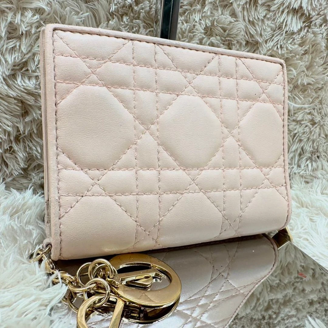 Portefeuille Christian Dior double pli rose beige cuir cannage compact occasion