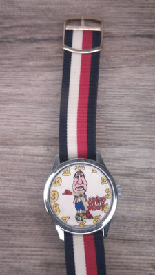 Spiro Agnew wrist watch red white and blue band Agnews fingers pointing at time