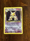 Alakazam 1/102 Holo Rare Base Set Pokemon Card WOTC 1999 Vintage HP/MP