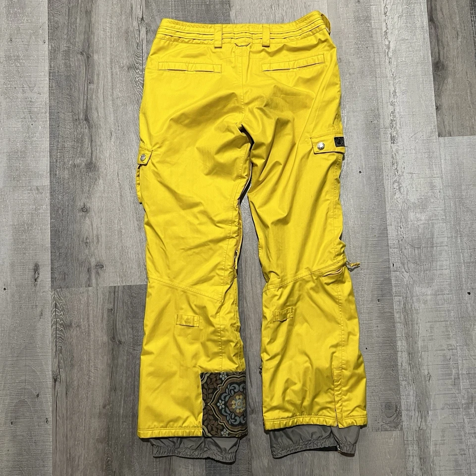 Pantalones de esquí Burton Dryride para nieve amarillos holgados estampado floral snowboard para mujer M Foto 2 de 4