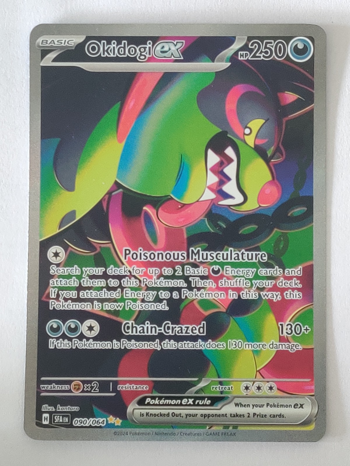 Okidogi ex Special Illustration Rare SV: Shrouded Fable 090/064 NM