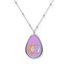 Sun and Moon Oval Necklace | Celestial Pendant, Purple Background