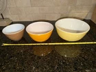3 vintage Pyrex Nesting Daisy pattern mixing bowls One Has Chip Yellow Brown
