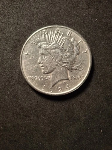 1x1924 silver peace dollar almost uncirculated.90% silver.