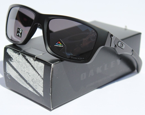 Lunettes de soleil carrées Oakley Jupiter noir mat/noir iridium Prizm OO9135-34 NEUVES - Photo 1 sur 10