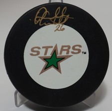 RUSS COURTNALL AUTOGRAPHED DALLAS STARS PUCK 