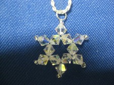 STERLING SILVER 18 INCH CHAIN WITH A CRYSTAL SNOWFLAKE PENDANT