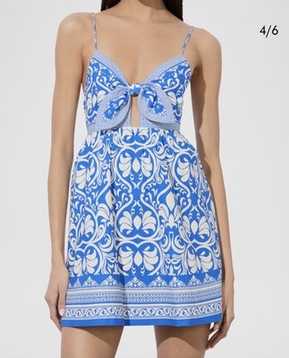alice and olivia blue and white dress The making of the #georgie dress A blue and white beauty hand beaded and embroidered.true art!