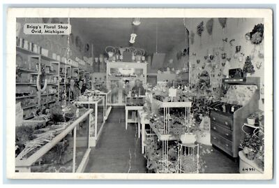 #ad 1951 Briggs Floral Shop Growing From Flower Glass Ovid Michigan Vintage Postcard $19.47