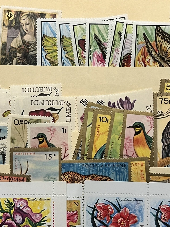 BURUNDI LOT OF STAMPS STUFFED IN A STOCK PAGE FLOWERS, BUTTERFLIES, BIRDS & MORE - Image 3 of 4