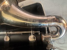 B  A  C Bass Clarinet used 1 Year in concert band. Broken bolt to tighten Neck