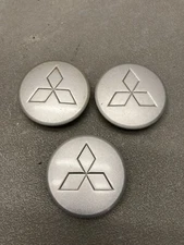 Set of (3) OEM Factory Genuine Mitsubishi MR554437 MR49120B Wheel Center Cap Set