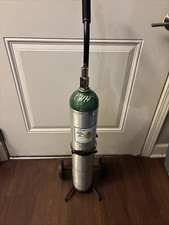 Oxygen Tank Holder With Wheels, One Tank Is Empty As Seen In Picture