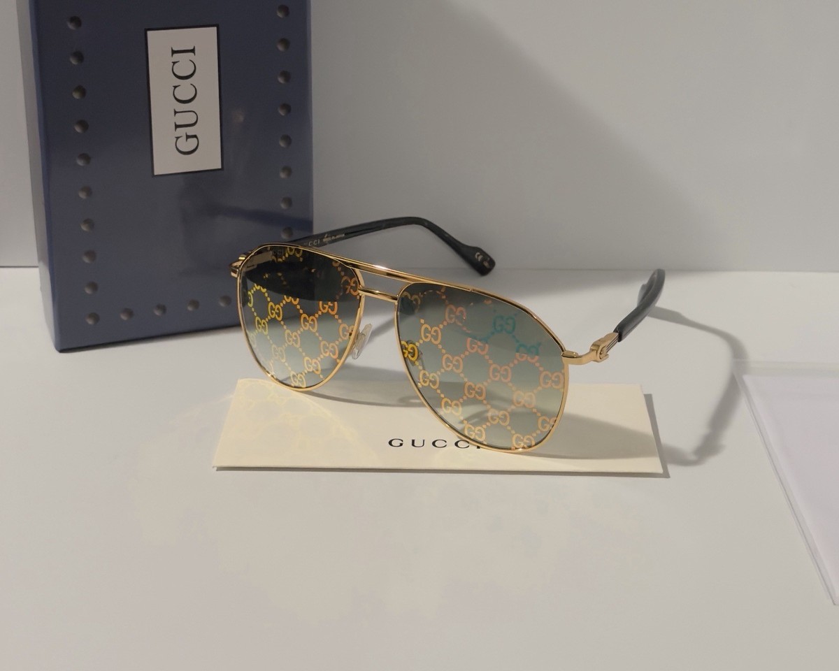 Gucci GG1220S 004 Sunglasses Gold Aviator Frame, Green Lenses Amazon.com: Gucci GG1220S Lasered GG Pattern Logo Pilot  main image 3