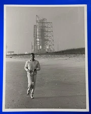 L GORDON COOPER JOGGING LAUNCH TOWER IN BACKGROUND CANDID SPECIAL INTEREST PHOTO