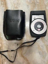 Sekonic Auto Lumi. Model L-158 . Barely Used. Comes With Leather Case.