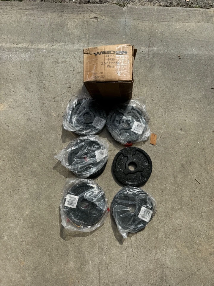 Placas de peso con barra estándar Weider 2,5 lb X (15 lb en total) 6 Foto 2 de 4