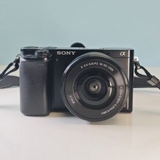 Sony Alpha A6000 Mirrorless Digital Camera w/16-50mm Lens English Language Black