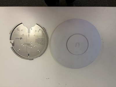 Ubiquiti UniFi AP AC HD (high-density enterprise WiFi access point).