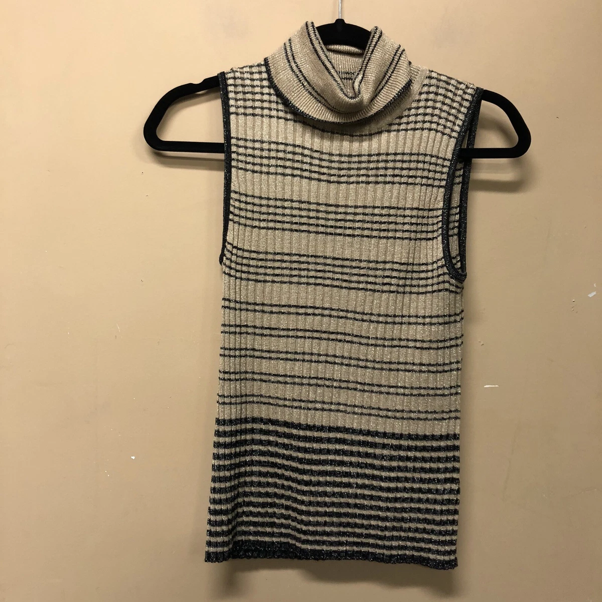 Cable and gauge sleeveless clearance turtleneck