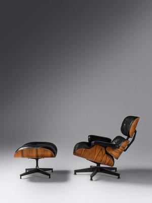 A Rosewood Mid-century modern Eames lounge chair and ottoman 670 and 671