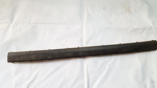 Rear bumper trim bar molding