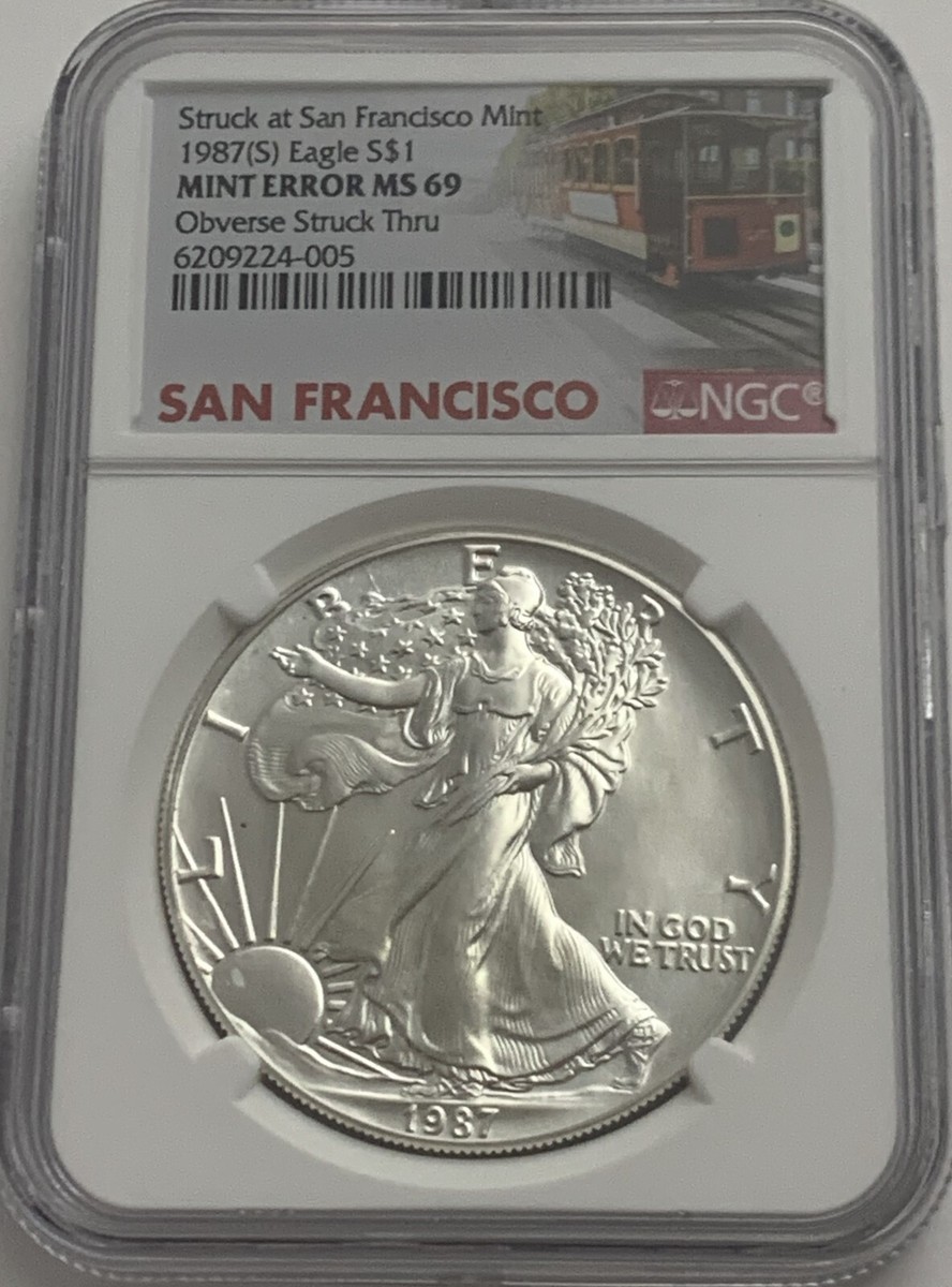 1987 S $1 NGC Mint Error MS69 America Silver Eagle Obverse Struck
