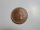 1903 Indian Head Penny in solid VF condition . But you decide!!!!!