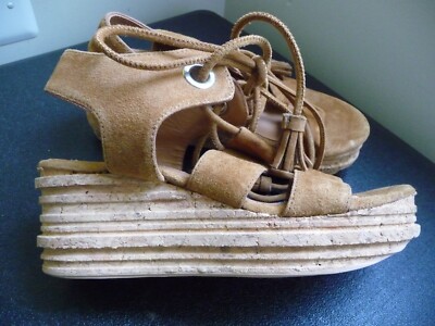 ANDRE ASSOUS MADE IN SPAIN BRIGITTE GLADIATOR SUEDE COGNAC WEDGE