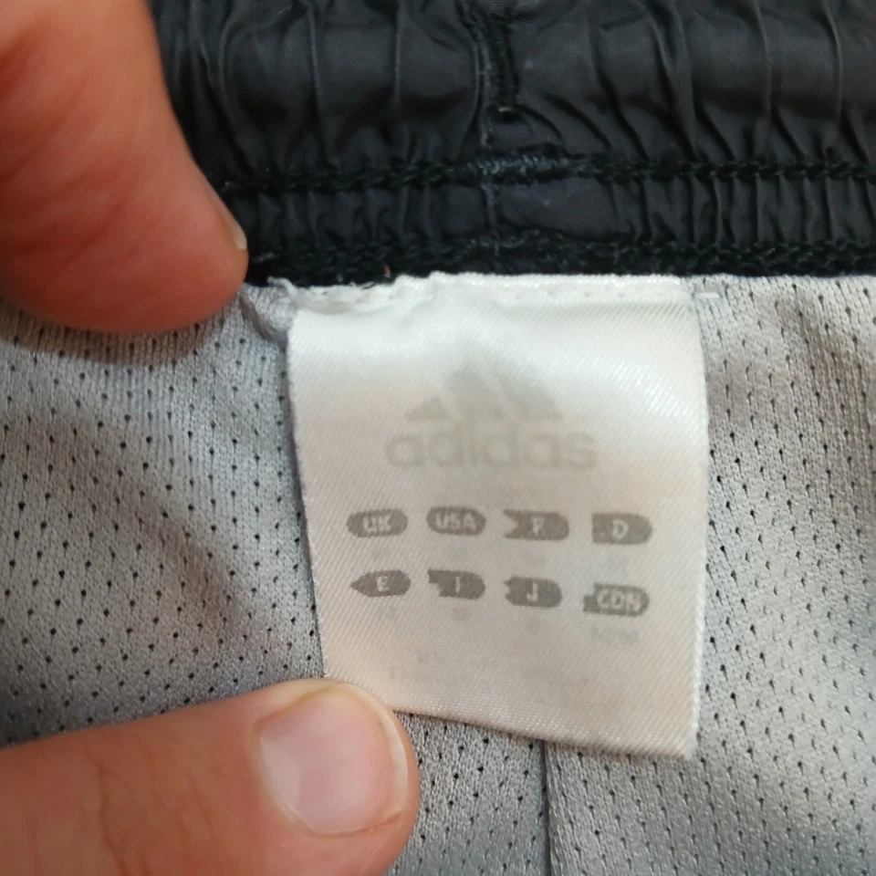 Pantalones deportivos Adidas de colección para hombre grandes negros de nailon forrados patinador Y2K Foto 2 de 4